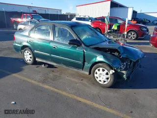 1999 Honda Civic VP with VIN 2HGEJ6614XH564053, listed as a IAAI auction lot 41317610 with 241,757 mi miles. Bid and sale history available at carsss.com. Image 1.