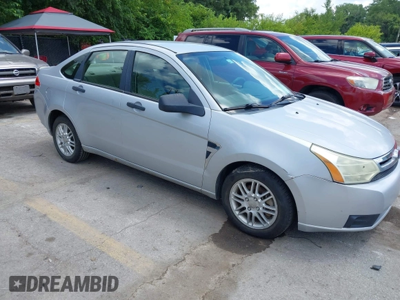 2008 Ford Focus SE with VIN 1FAHP35N58W285331, listed as a IAAI auction lot 42750470 with 190,517 mi miles and . Bid and sale history available at DreamBid. Image 1.