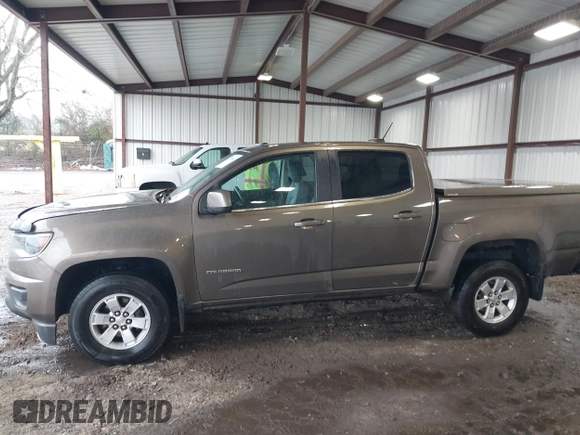 2015 Chevrolet Colorado 2WD WT z VIN 1GCGSAE34F1270479, wystawiony jako IAAI lot #41768612 z przebiegiem 158 984 mil mil oraz . Historia ofert i sprzedaży dostępna na DreamBid. Obrazek 14.