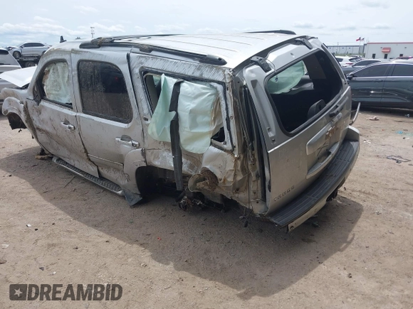 2014 Chevrolet Tahoe LT with VIN 1GNSKBE02ER147079, listed as a IAAI auction lot 42204312 with Not provided miles and . Bid and sale history available at DreamBid. Image 3.