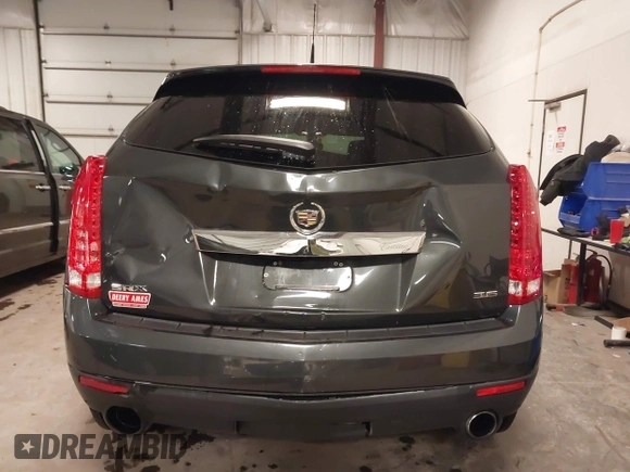 2014 Cadillac SRX with VIN 3GYFNAE34ES665630, listed as a IAAI auction lot 41315281 with 99,009 mi miles and . Bid and sale history available at DreamBid. Image 16.