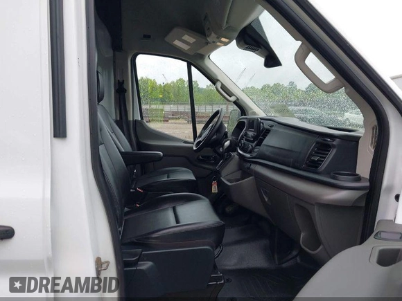 2023 Ford Transit Cargo с VIN 1FTBR3U84PKB02433, выставлен на аукционе IAAI как лот 41895220 с пробегом 87 542 миль миль и . История ставок и продаж доступна на DreamBid. Изображение 5.