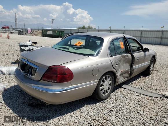 2001 Lincoln Continental z VIN 1LNHM97V21Y698784, wystawiony jako Copart lot #64040134 z przebiegiem Nie podano mil oraz Szkoda całkowita • Salvage title. Historia ofert i sprzedaży dostępna na DreamBid. Obrazek 3.