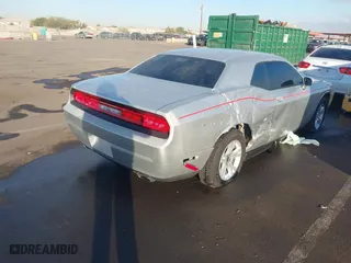 2012 Dodge Challenger SXT with VIN 2C3CDYAG0CH133549, listed as a IAAI auction lot 41368901 with 118,154 mi miles. Bid and sale history available at carsss.com. Image 4.
