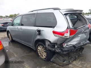 2012 Toyota Sienna XLE AAS with VIN 5TDYK3DC6CS243008, listed as a IAAI auction lot 40351580 with 157,752 mi miles and . Bid and sale history available at DreamBid. Image 14.