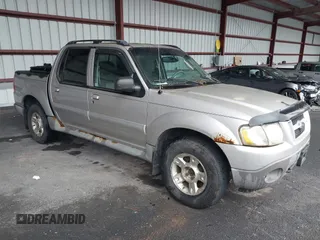 2003 Ford Explorer Sport Trac XLS z VIN 1FMZU77E63UA09493, wystawiony jako IAAI lot #42340903 z przebiegiem 203 029 mil mil oraz . Historia ofert i sprzedaży dostępna na DreamBid. Obrazek 1.