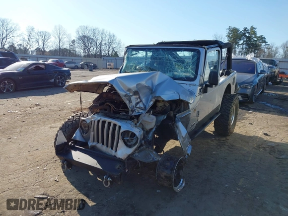 2006 Jeep Wrangler Unlimited LWB with VIN 1J4FA44S76P755148, listed as a IAAI auction lot 41774840 with 167,914 mi miles. Bid and sale history available at carsss.com. Image 6.