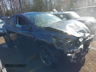 2024 Tesla Model Y Long Range z VIN 7SAYGAEE5RF127224, wystawiony jako IAAI lot #41813572 z przebiegiem 7256 mil mil oraz . Historia ofert i sprzedaży dostępna na DreamBid. Obrazek 1.