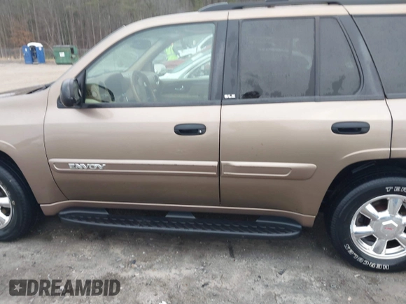 2003 GMC Envoy SLE with VIN 1GKDT13S332264984, listed as a IAAI auction lot 41523191 with 227,004 mi miles. Bid and sale history available at carsss.com. Image 14.