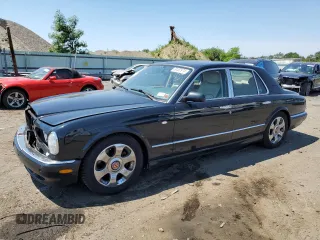 2001 Bentley Arnage with VIN SCBLC31E31CX05992, listed as a Copart auction lot 60462974 with 253,028 mi miles and Salvage Title. Bid and sale history available at DreamBid. Image 1.