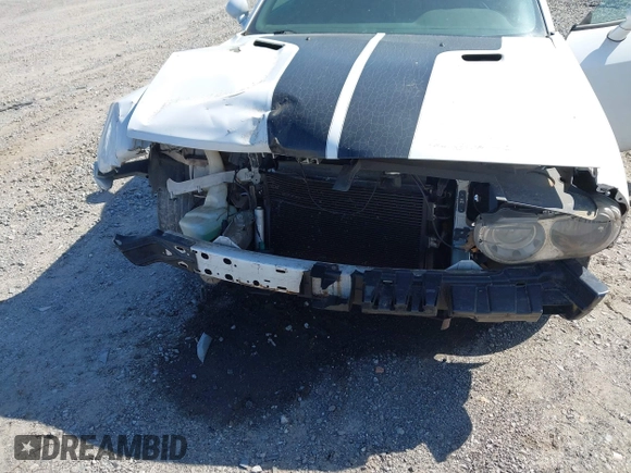 2012 Dodge Challenger SXT Plus with VIN 2C3CDYAG0CH196344, listed as a IAAI auction lot 42005410 with 203,655 mi miles. Bid and sale history available at carsss.com. Image 6.