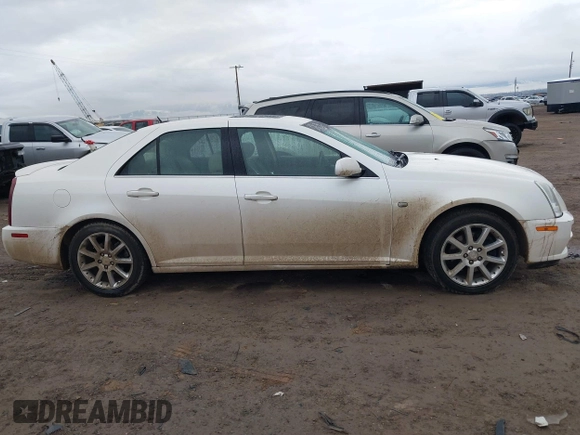 2005 Cadillac STS z VIN 1G6DC67A250231552, wystawiony jako IAAI lot #41765312 z przebiegiem 201 611 mil mil oraz . Historia ofert i sprzedaży dostępna na DreamBid. Obrazek 13.
