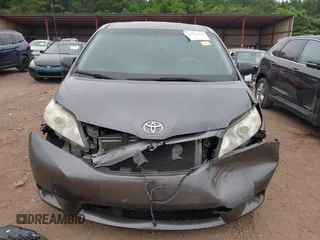 2014 Toyota Sienna L with VIN 5TDZK3DC8ES470837, listed as a IAAI auction lot 42426844 with 302,661 mi miles and . Bid and sale history available at DreamBid. Image 6.