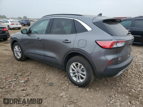 2021 Ford Escape SE with VIN 1FMCU9G64MUB16148, listed as a Copart auction lot 60994595 with 7,772 mi miles and Salvage title. Bid and sale history available at DreamBid. Image 2.