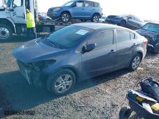 2016 Kia Forte LX with VIN KNAFK4A69G5463005, listed as a IAAI auction lot 41423285 with 204,118 mi miles. Bid and sale history available at carsss.com. Image 2.