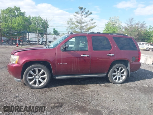 2009 Chevrolet Tahoe 2LT z VIN 1GNFK23079R138145, wystawiony jako IAAI lot #42109914 z przebiegiem 211 063 mil mil oraz . Historia ofert i sprzedaży dostępna na DreamBid. Obrazek 14.