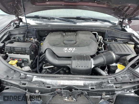 2012 Dodge Durango Citadel z VIN 1C4RDJEG8CC125970, wystawiony jako Copart lot #44002615 z przebiegiem 162 496 mil mil oraz Szkoda całkowita • Salvage title. Historia ofert i sprzedaży dostępna na DreamBid. Obrazek 11.