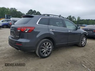 2014 Mazda CX-9 Grand Touring with VIN JM3TB2DA8E0440925, listed as a Copart auction lot 61002275 with 180,373 mi miles and Salvage title. Bid and sale history available at DreamBid. Image 3.