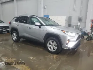 2020 Toyota RAV4 Hybrid XLE with VIN 2T3R6RFV1LW001235, listed as a Copart auction lot 56818635 with 105,234 mi miles and Salvage title. Bid and sale history available at DreamBid. Image 4.
