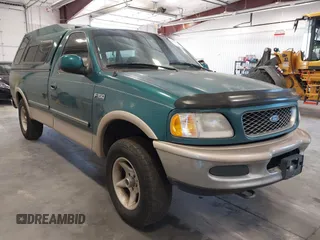 1997 Ford F-150 z VIN 1FTEF18L3VKC01590, wystawiony jako IAAI lot #41807198 z przebiegiem 210 000 mil mil oraz . Historia ofert i sprzedaży dostępna na DreamBid. Obrazek 1.