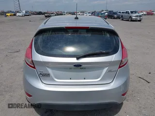 2019 Ford Fiesta SE z VIN 3FADP4EJ9KM107124, wystawiony jako IAAI lot #42067464 z przebiegiem 89 076 mil mil oraz . Historia ofert i sprzedaży dostępna na DreamBid. Obrazek 17.