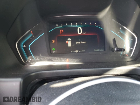 2018 Honda Odyssey Touring with VIN 5FNRL6H8XJB018438, listed as a Copart auction lot 61876505 with 104,581 mi miles and Salvage title. Bid and sale history available at DreamBid. Image 9.