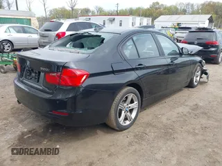 2014 BMW 3 Series 320i xDrive with VIN WBA3C3C59EF984070, listed as a IAAI auction lot 42063569 with 169,002 mi miles and . Bid and sale history available at DreamBid. Image 4.