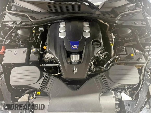 2014 Maserati Ghibli S Q4 z VIN ZAM57RTA9E1112724, wystawiony jako Copart lot #57189295 z przebiegiem 45 525 mil mil oraz Szkody całkowita. Historia ofert i sprzedaży dostępna na DreamBid. Obrazek 7.