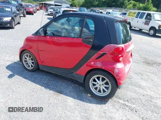 2010 Smart fortwo Pure with VIN WMEEJ3BA0AK373668, listed as a IAAI auction lot 42675428 with 139,616 mi miles and . Bid and sale history available at DreamBid. Image 3.