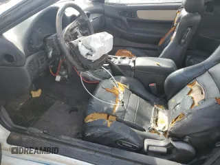 1992 Mitsubishi 3000GT z VIN JA3XE74C1NY066108, wystawiony jako Copart lot #75669024 z przebiegiem 177 762 mil mil oraz Nie do naprawy. Historia ofert i sprzedaży dostępna na DreamBid. Obrazek 7.