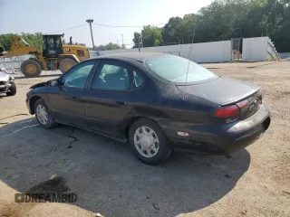 1998 Ford Taurus LX z VIN 1FAFP52U9WA174855, wystawiony jako Copart lot #66728184 z przebiegiem 104 796 mil mil oraz Szkody całkowita. Historia ofert i sprzedaży dostępna na DreamBid. Obrazek 2.