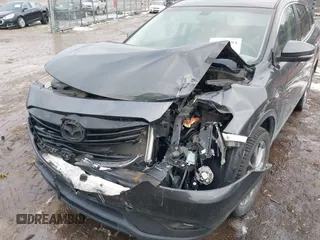 2015 Mazda CX-9 Grand Touring with VIN JM3TB2DAXF0447537, listed as a IAAI auction lot 41191694 with 157,113 mi miles. Bid and sale history available at carsss.com. Image 6.