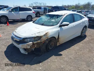 2016 Honda Civic Sedan LX with VIN 19XFC2F54GE018440, listed as a IAAI auction lot 41842654 with 99,315 mi miles. Bid and sale history available at carsss.com. Image 2.