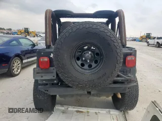 2005 Jeep Wrangler X with VIN 1J4FA39S25P367360, listed as a Copart auction lot 57504365 with 112,125 mi miles and Salvage title. Bid and sale history available at DreamBid. Image 6.