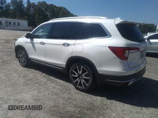 2019 Honda Pilot Touring 8-Passenger with VIN 5FNYF5H91KB038679, listed as a IAAI auction lot 40200012 with 70,582 mi miles. Bid and sale history available at carsss.com. Image 3.
