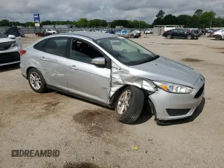 2017 Ford Focus SE with VIN 1FADP3F23HL328312, listed as a Copart auction lot 57028125 with 116,498 mi miles and Salvage title. Bid and sale history available at DreamBid. Image 4.