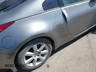 2005 Nissan 350Z 35th Anniversary Edition z VIN JN1AZ34D15M608766, wystawiony jako IAAI lot #41852248 z przebiegiem 261 809 mil mil oraz . Historia ofert i sprzedaży dostępna na DreamBid. Obrazek 12.