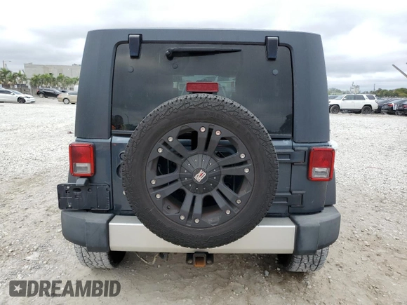 2007 Jeep Wrangler Unlimited X with VIN 1J8GA39107L105101, listed as a Copart auction lot 88559675 with 213,902 mi miles and Salvage title. Bid and sale history available at DreamBid. Image 6.