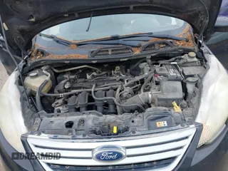 2012 Ford Fiesta SE z VIN 3FADP4BJ8CM173590, wystawiony jako IAAI lot #40732721 z przebiegiem 156 874 mil mil oraz . Historia ofert i sprzedaży dostępna na DreamBid. Obrazek 10.