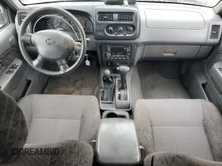 2001 Nissan Xterra XE z VIN 5N1ED28Y31C531253, wystawiony jako Copart lot #49736505 z przebiegiem 318 998 mil mil oraz Szkoda całkowita • Salvage title. Historia ofert i sprzedaży dostępna na DreamBid. Obrazek 8.