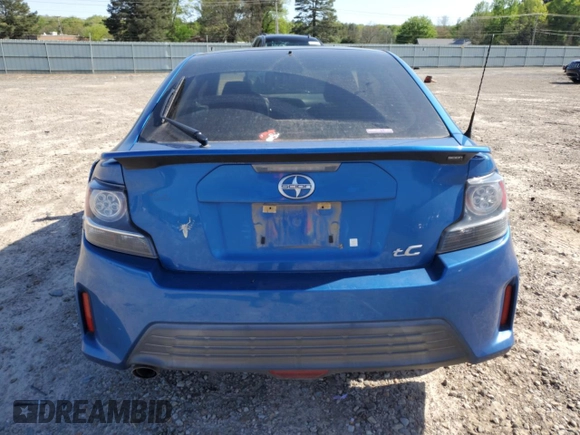 2016 Scion tC z VIN JTKJF5C75GJ022534, wystawiony jako Copart lot #52254005 z przebiegiem 103 812 mil mil oraz Szkoda całkowita • Salvage title. Historia ofert i sprzedaży dostępna na DreamBid. Obrazek 6.
