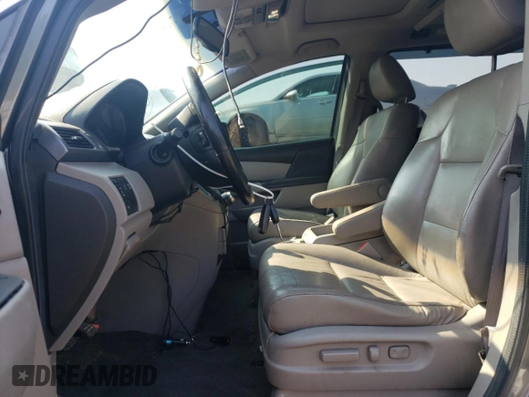 2012 Honda Odyssey Touring with VIN 5FNRL5H90CB505590, listed as a Copart auction lot 62566715 with 323,092 mi miles and Clean title. Bid and sale history available at DreamBid. Image 7.