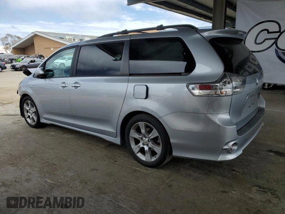2013 Toyota Sienna SE with VIN 5TDXK3DC6DS386716, listed as a Copart auction lot 63122435 with 77,371 mi miles and Salvage title. Bid and sale history available at DreamBid. Image 2.