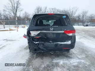 2015 Honda Odyssey EX-L with VIN 5FNRL5H60FB018030, listed as a IAAI auction lot 41608357 with 166,214 mi miles and . Bid and sale history available at carsss.com. Image 16.