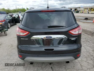 2015 Ford Escape Titanium с VIN 1FMCU9J90FUA55791, выставлен на аукционе Copart как лот 55873625 с пробегом 113 263 миль миль и Списание • Salvage title. История ставок и продаж доступна на DreamBid. Изображение 6.