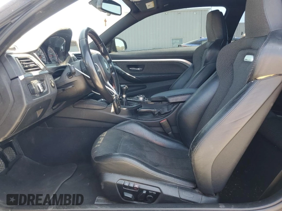 2015 BMW M4 with VIN WBS3R9C50FK333819, listed as a Copart auction lot 61105565 with 168,932 mi miles and Salvage title. Bid and sale history available at DreamBid. Image 7.