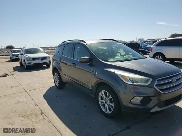 2017 Ford Escape SE with VIN 1FMCU0GDXHUB64978, listed as a Copart auction lot 46872365 with 105,091 mi miles and Clean Title. Bid and sale history available at carsss.com. Image 14.