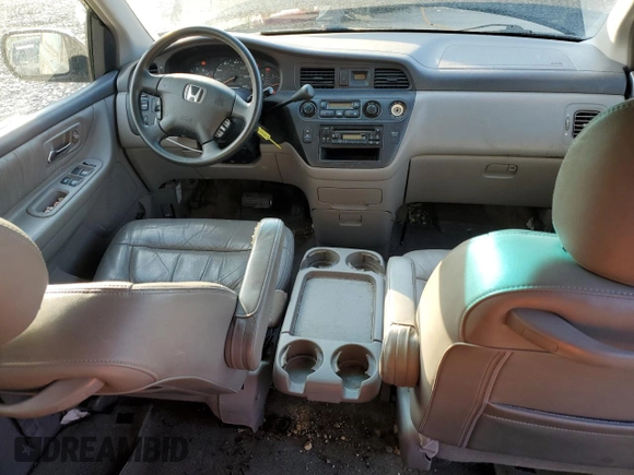 2003 Honda Odyssey EX-L with VIN 5FNRL189X3B114181, listed as a Copart auction lot 54316105 with 103,214 mi miles and Salvage Title. Bid and sale history available at DreamBid. Image 8.