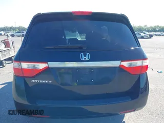 2011 Honda Odyssey EX-L with VIN 5FNRL5H66BB058333, listed as a IAAI auction lot 42172045 with 215,723 mi miles and . Bid and sale history available at carsss.com. Image 16.