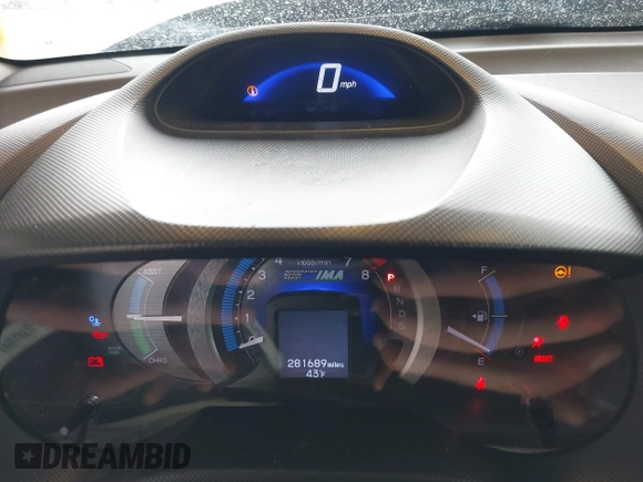 2010 Honda Insight EX with VIN JHMZE2H7XAS034098, listed as a IAAI auction lot 41939869 with 281,689 mi miles and . Bid and sale history available at DreamBid. Image 7.